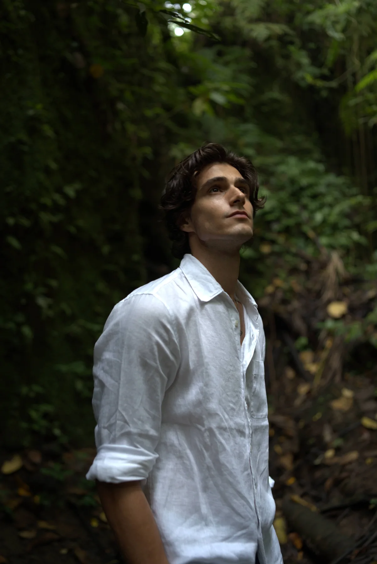 Luca Bold on location, portrait in a white shirt